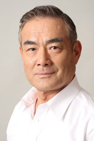 辻万长